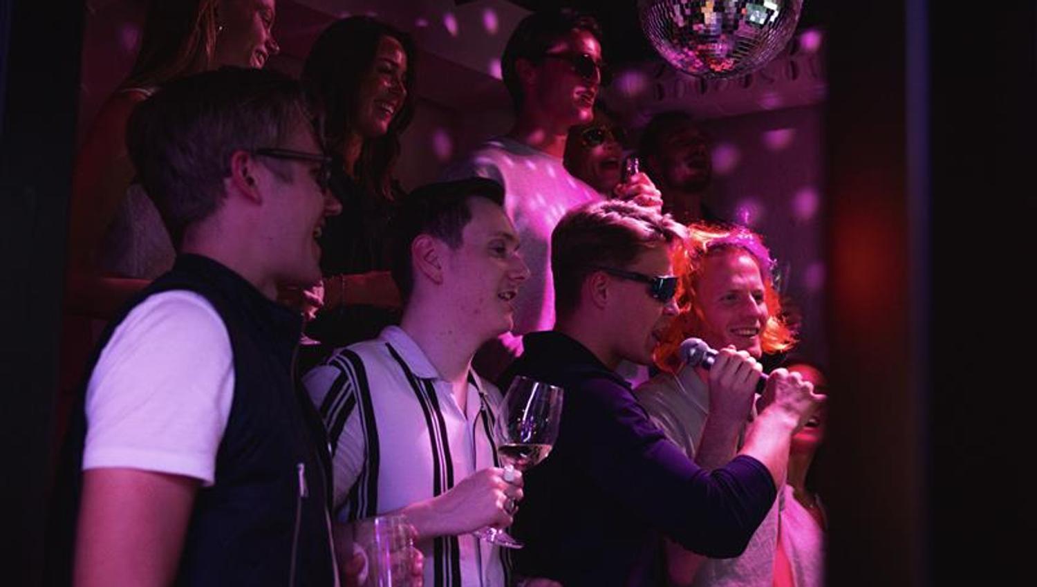people singing karaoke