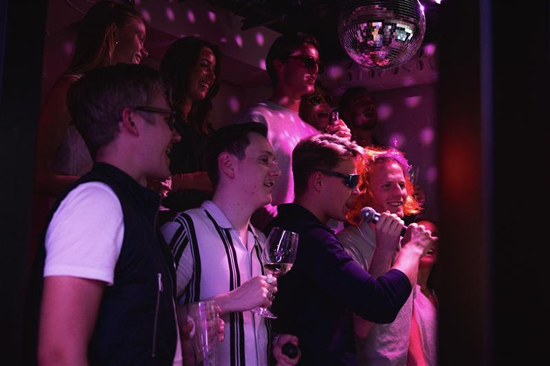 people singing karaoke