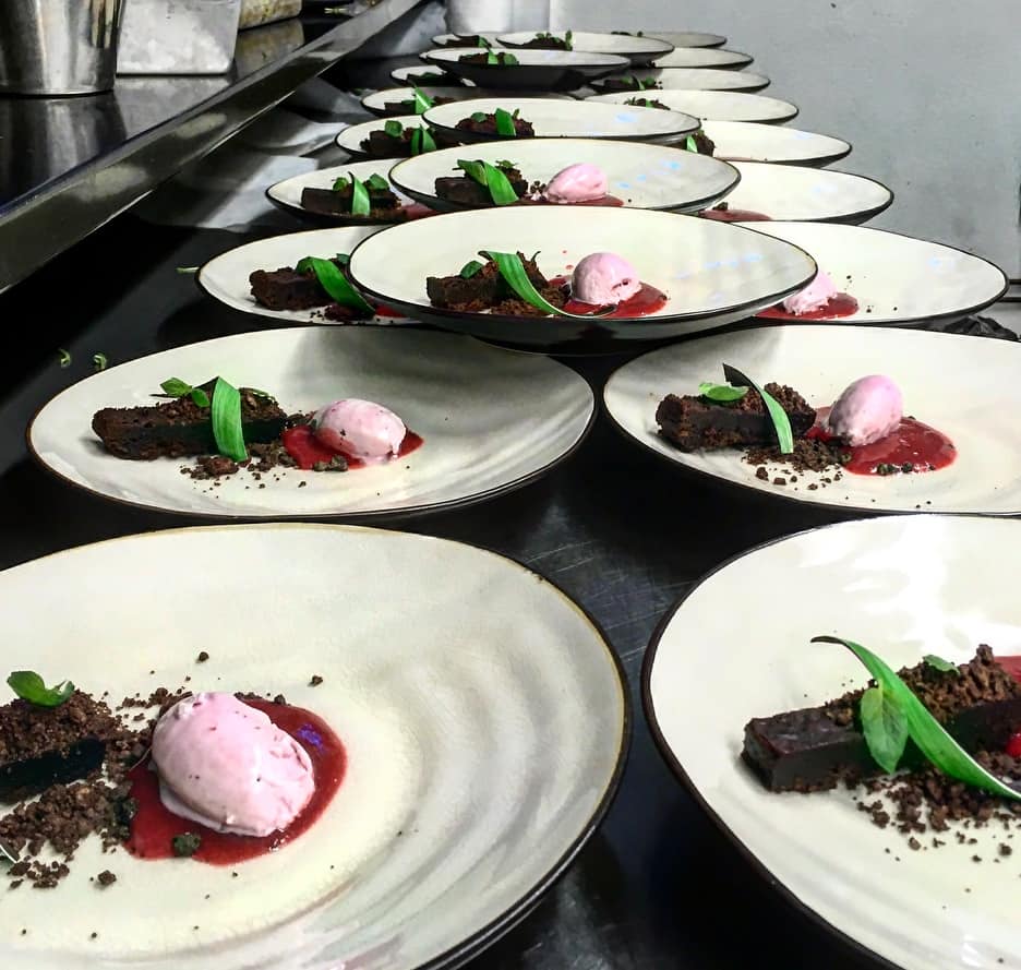 Many plates of dessert