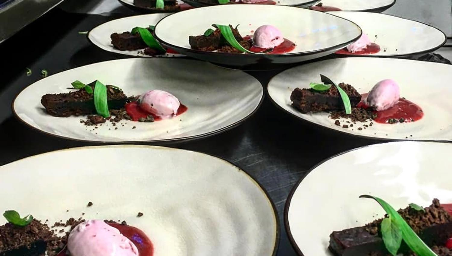 Many plates of dessert