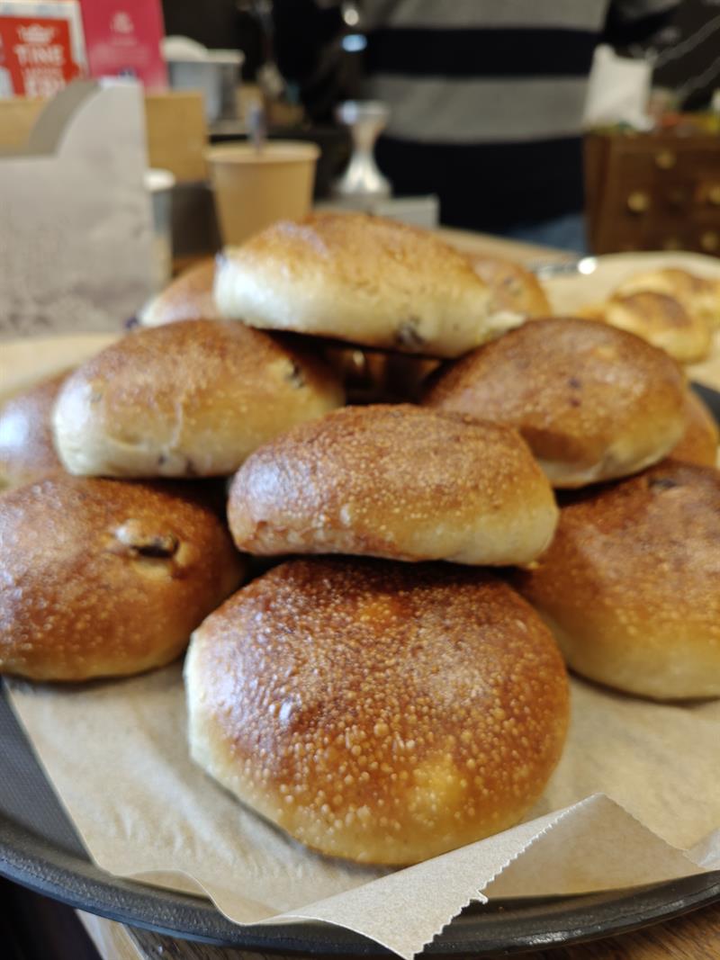 Fresh buns and pastry on a tray
