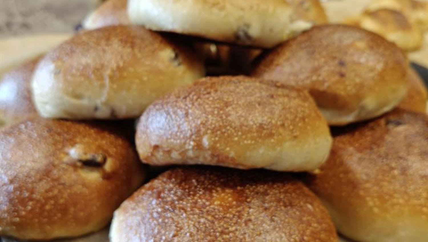 Fresh buns and pastry on a tray