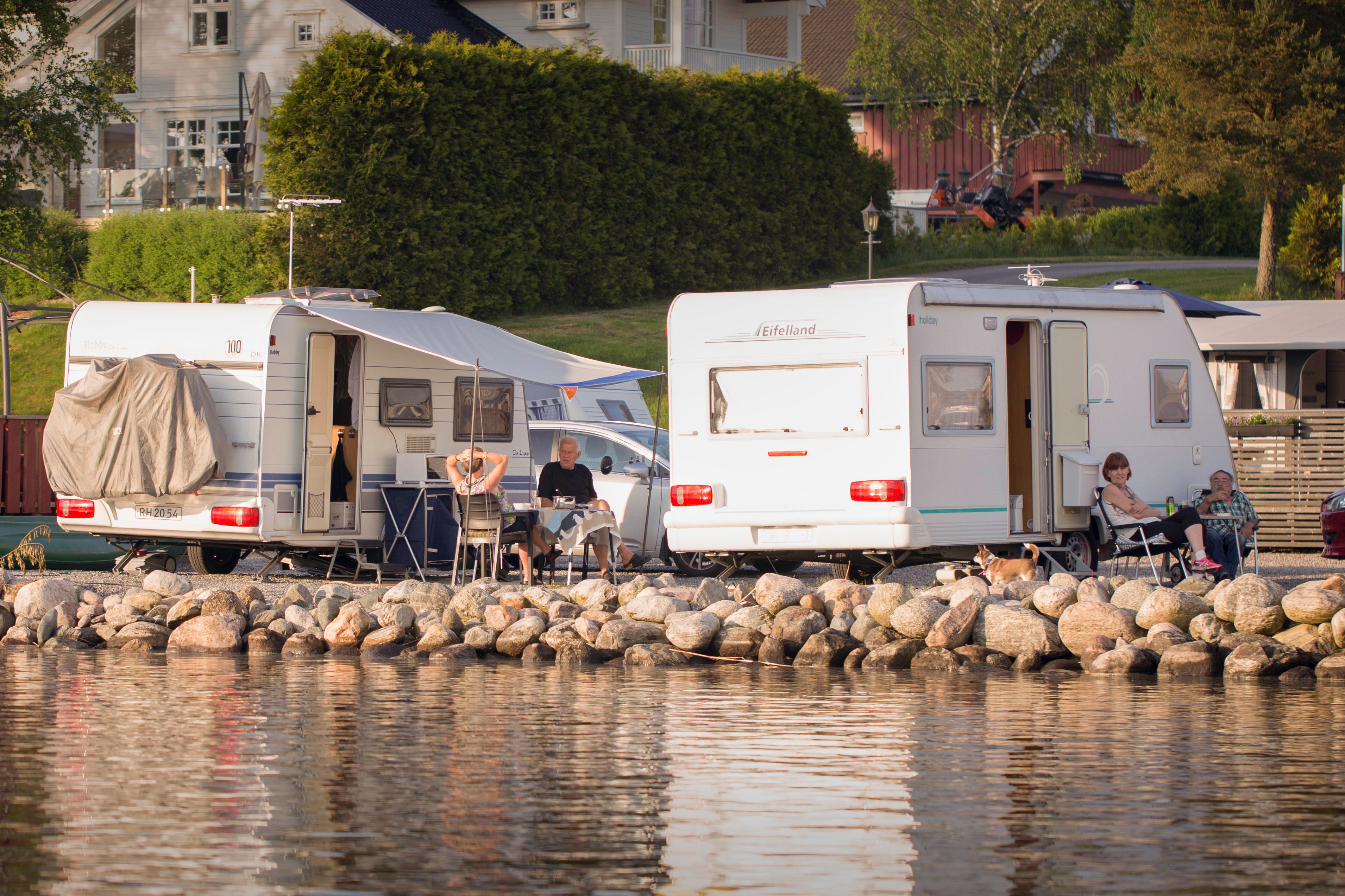 Two caravans near the water