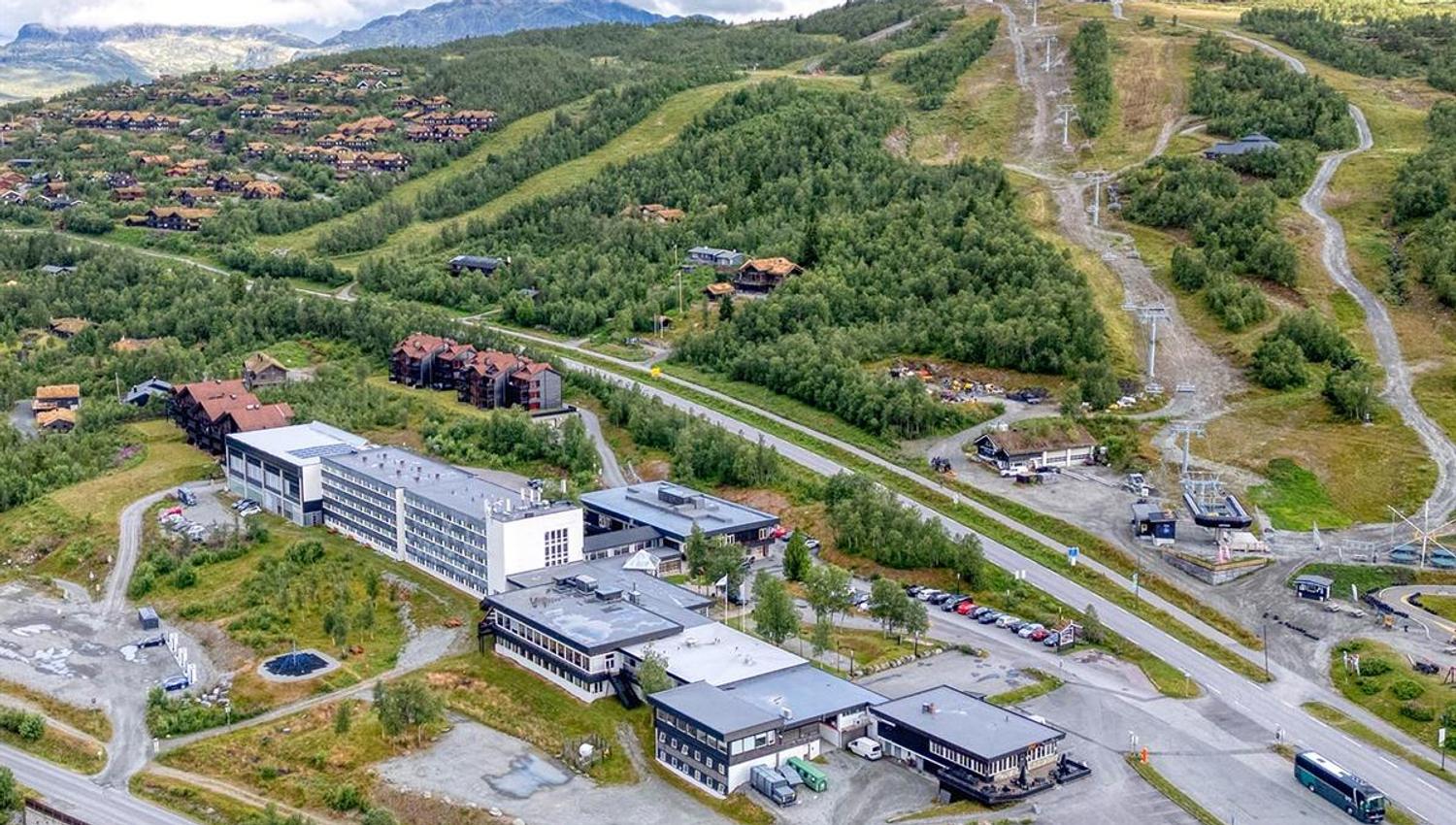 Aerial image of a hotel in a mountain village