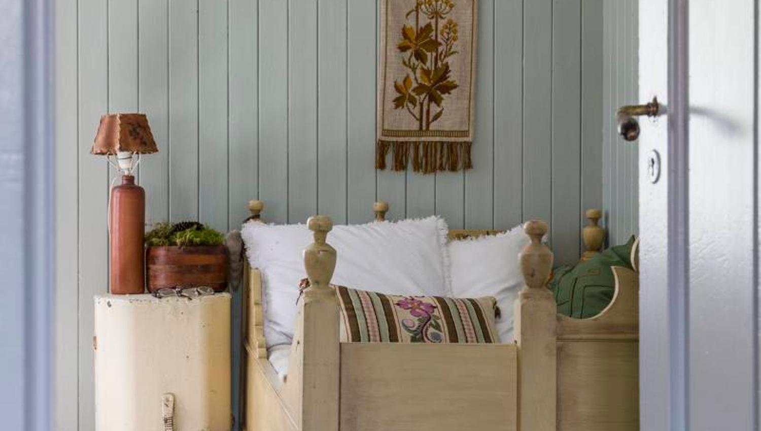a bedroom with an oldfashioned bed