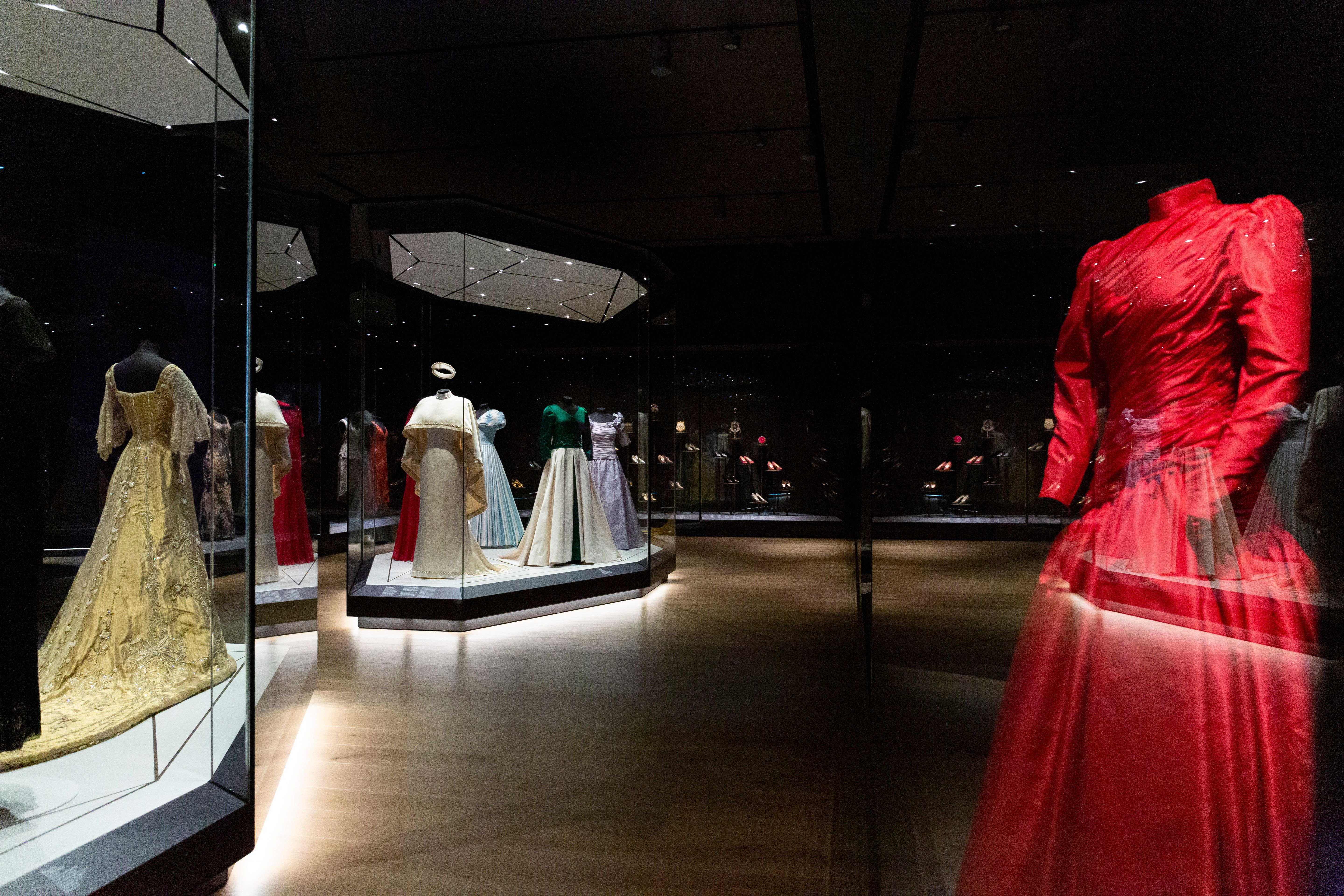 Various old dresses in an exhibition.
