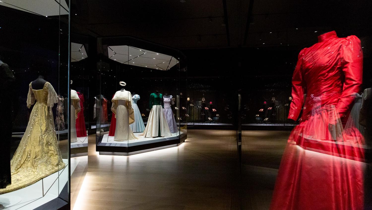 Various old dresses in an exhibition.