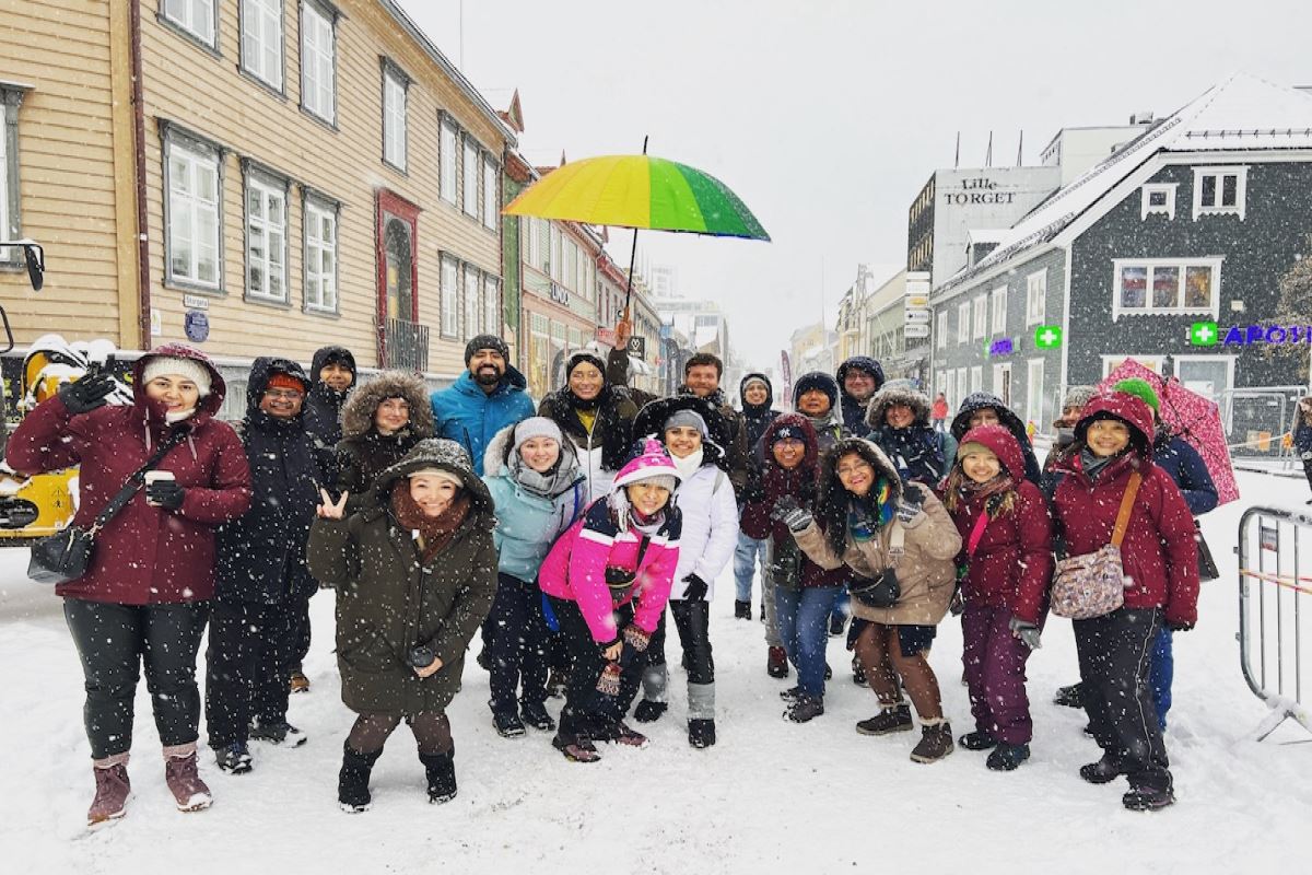 Guests pose for an end-of-tour photo