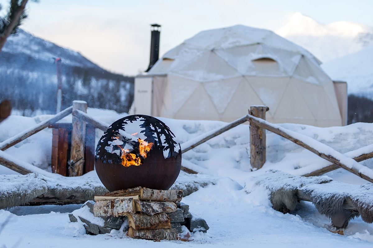 Stylised fireplace beside the overnight domes
