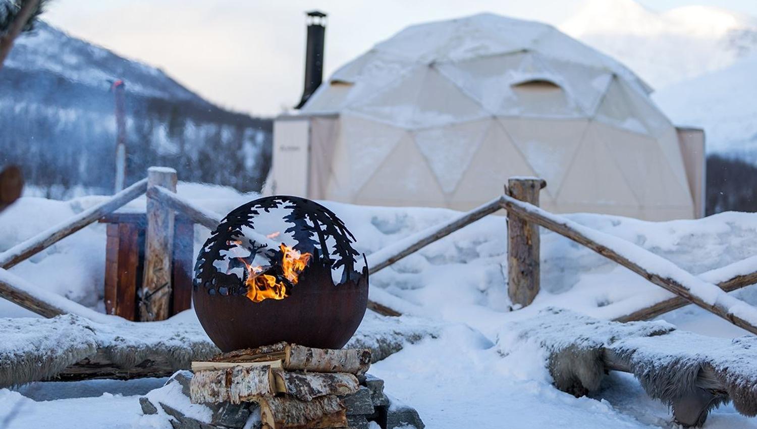 Stylised fireplace beside the overnight domes
