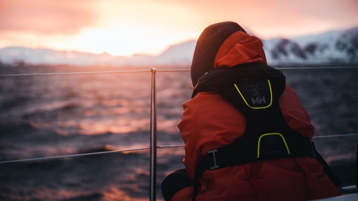 A person enjoying the view on the sailing boat