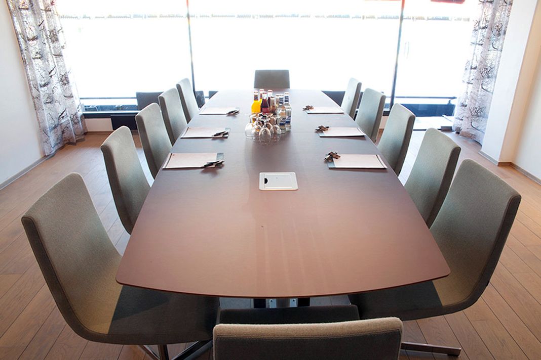 Long table in conference room.