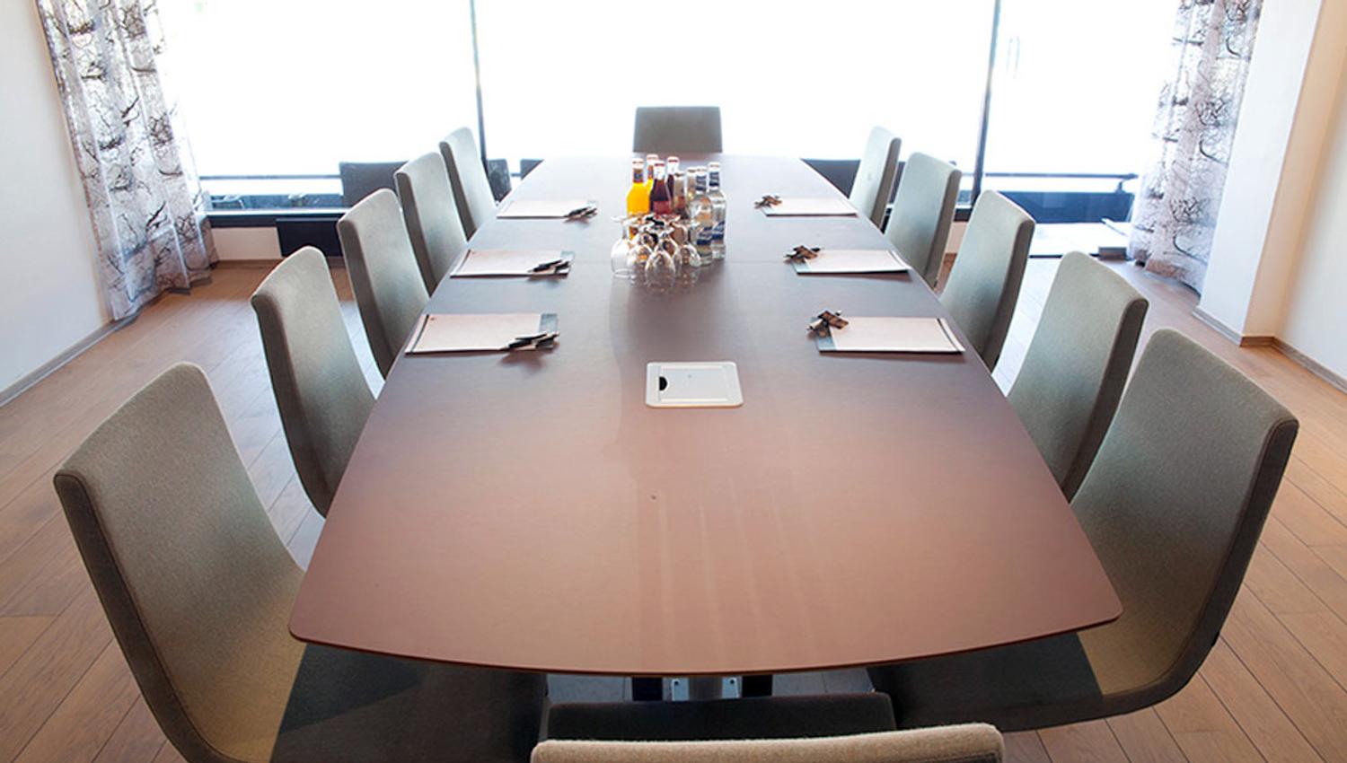 Long table in conference room.