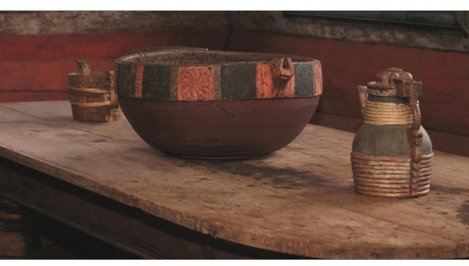 Brown bowl, bucket, and pitcher.