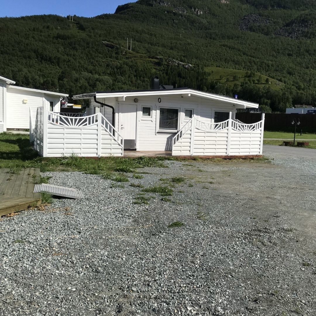 A white cabin at the camping