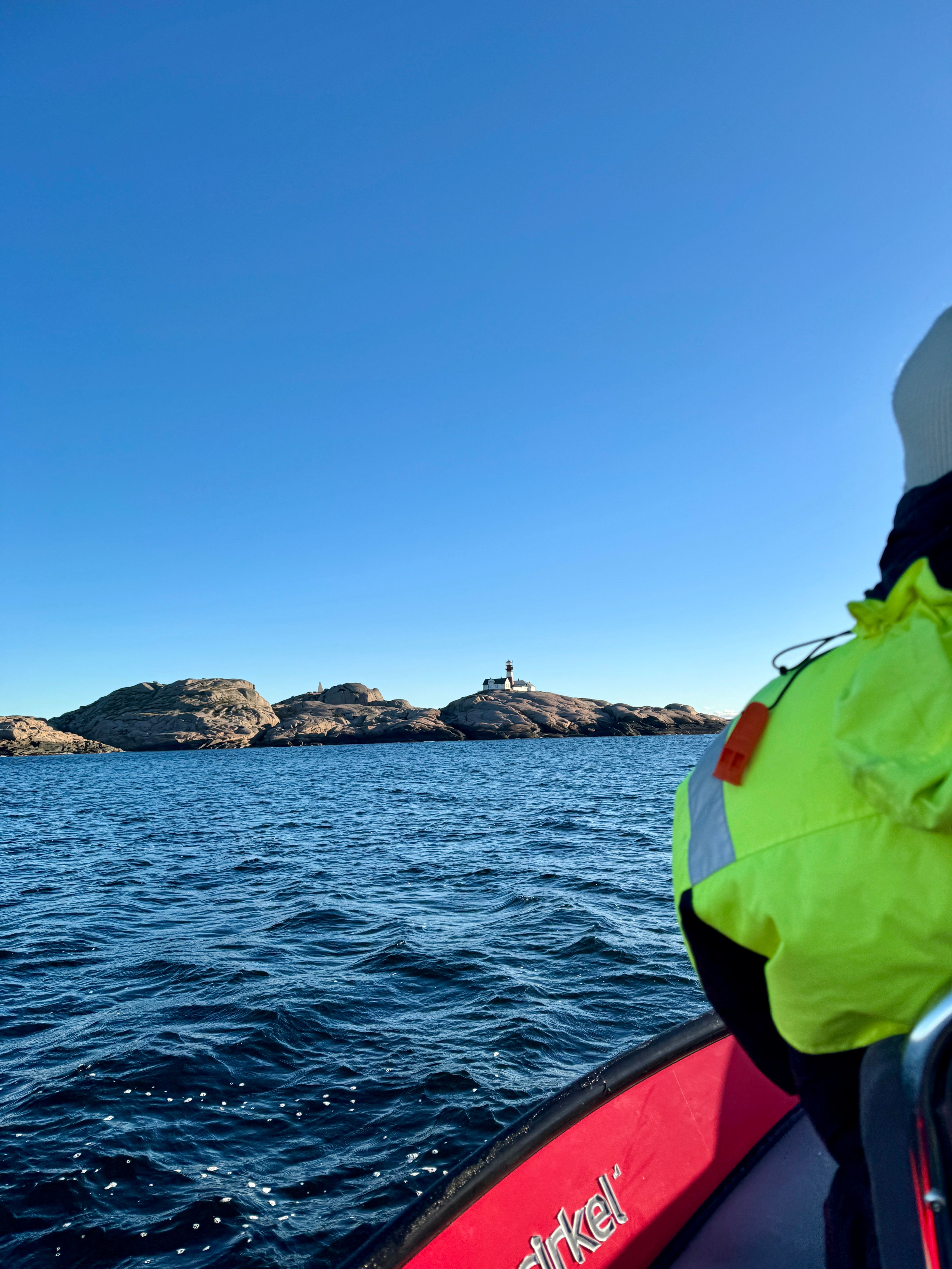 Ryvingen Lighthouse, seen from a RIB boat at sea