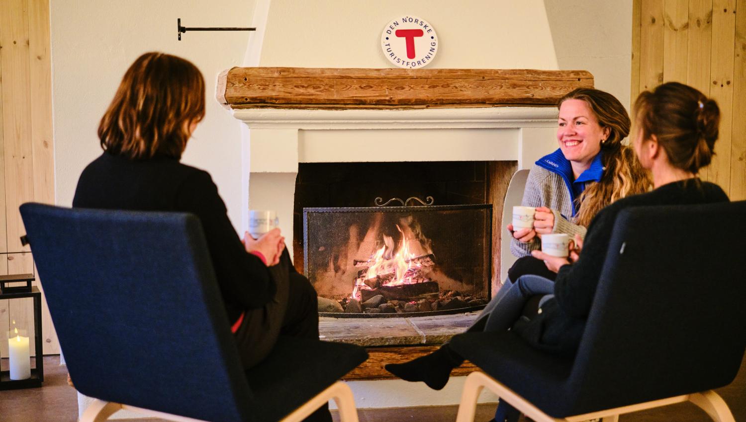 Gils in front of fireplace