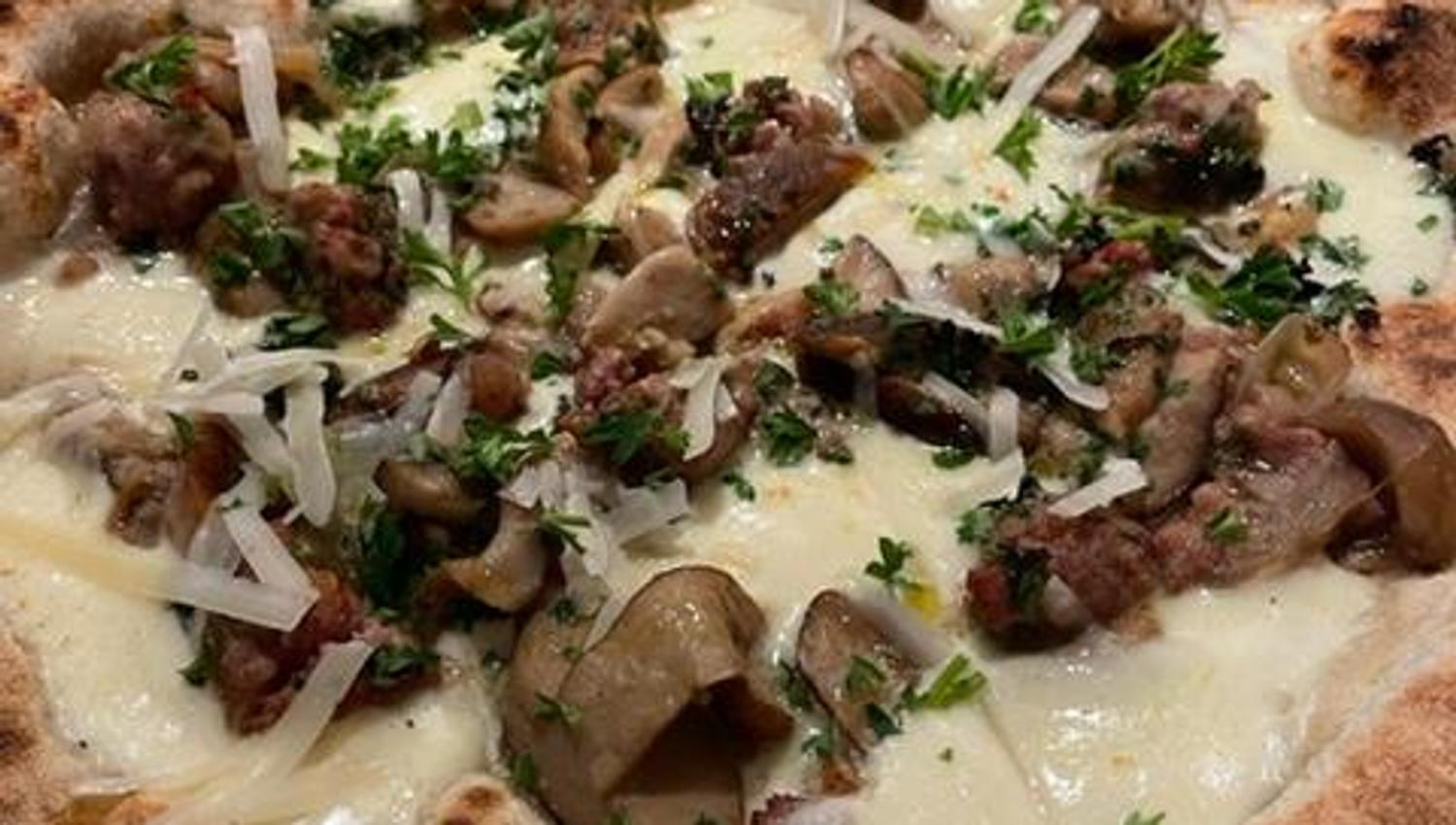 Detail of pizza with Salsiccia topping.