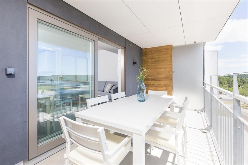 Sittegruppe på balkongen til et hotellrom