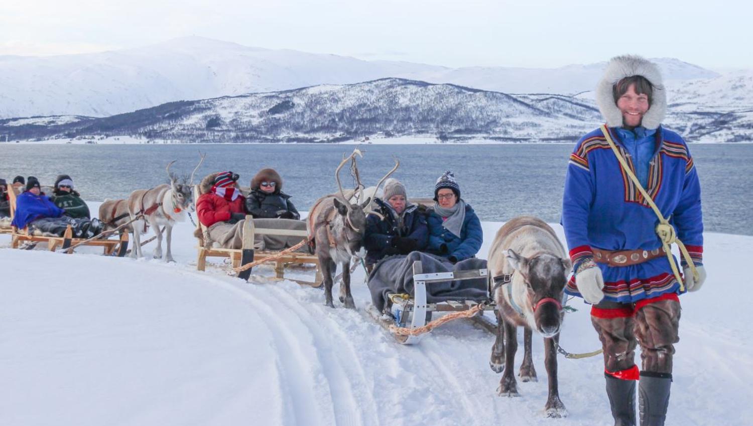Guests doing reindeer sledding
