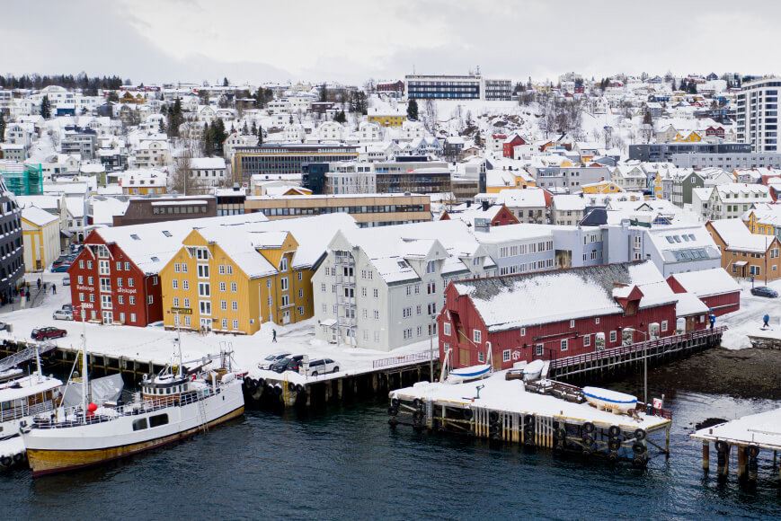 The quay in Tromso with the The Polar Museum 