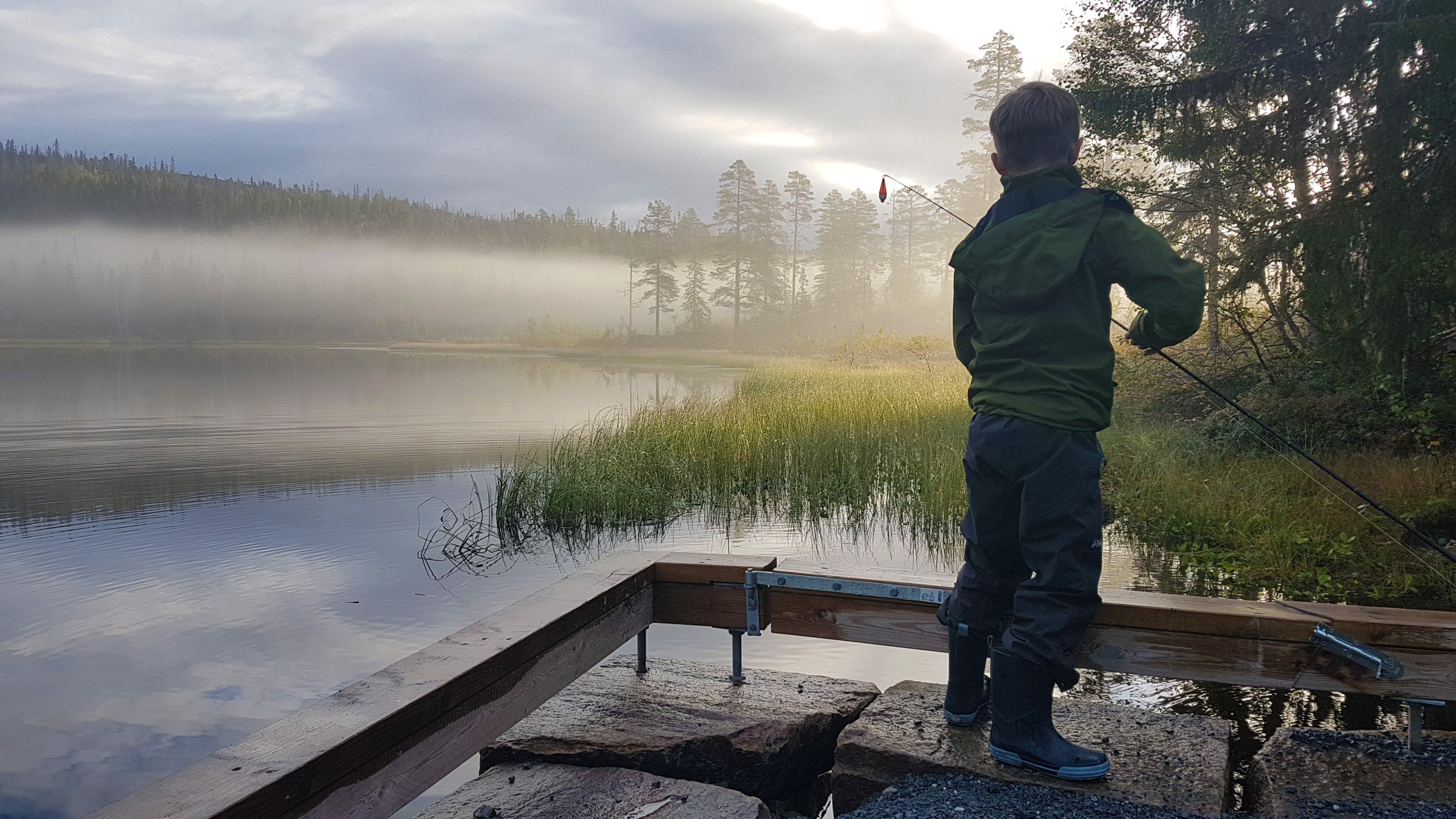 Fishing by the cabin