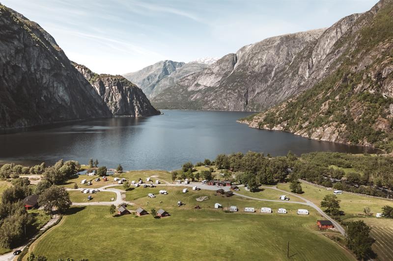 A drone photo of the campground, with the Eidfjord lake in the background.