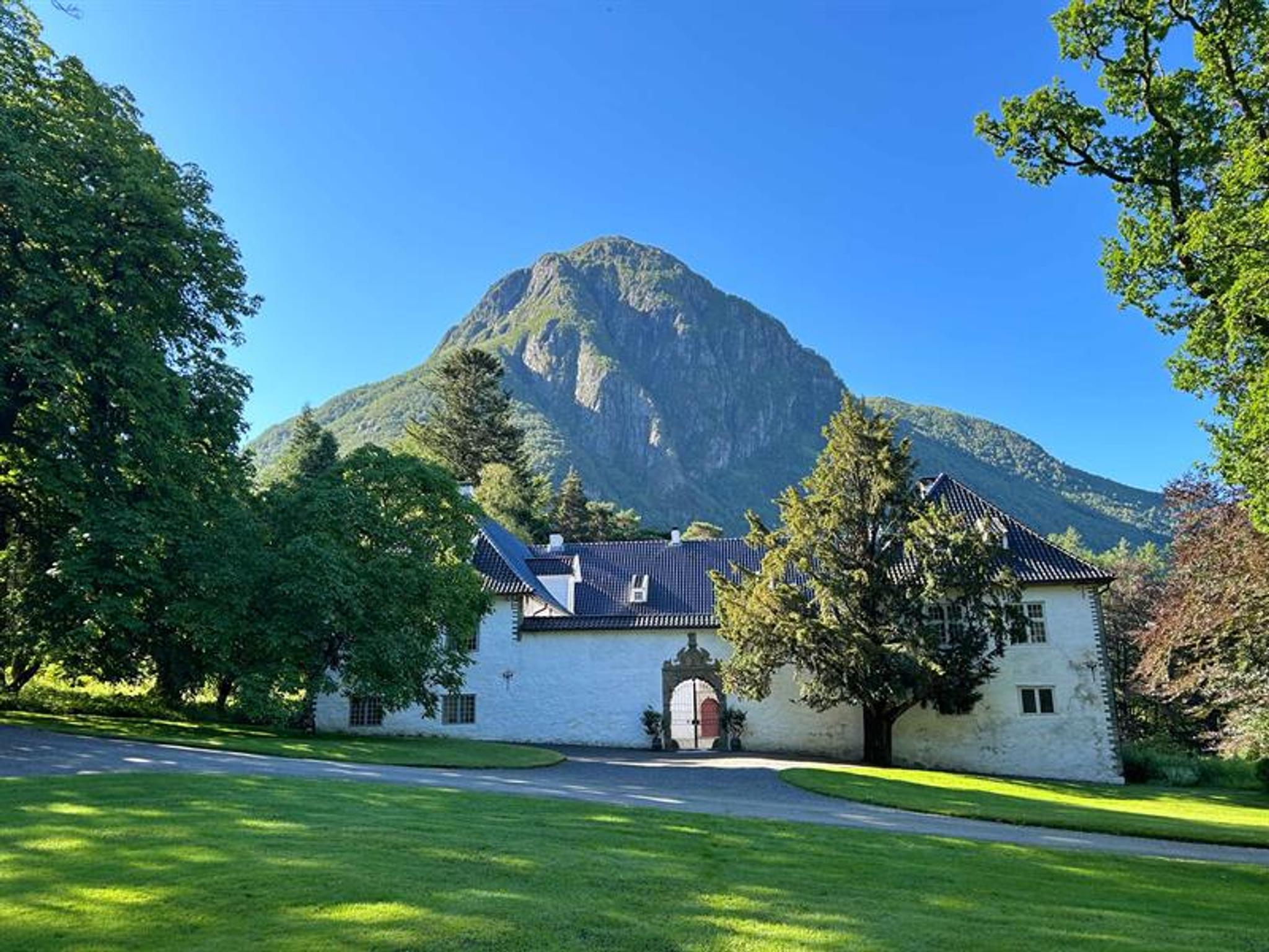 Baroniet Rosendal with scenic mountain views in Hardanger, Norway.