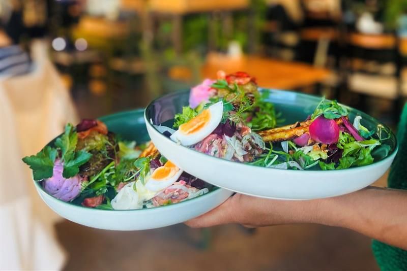 Detail of two bowls with salad