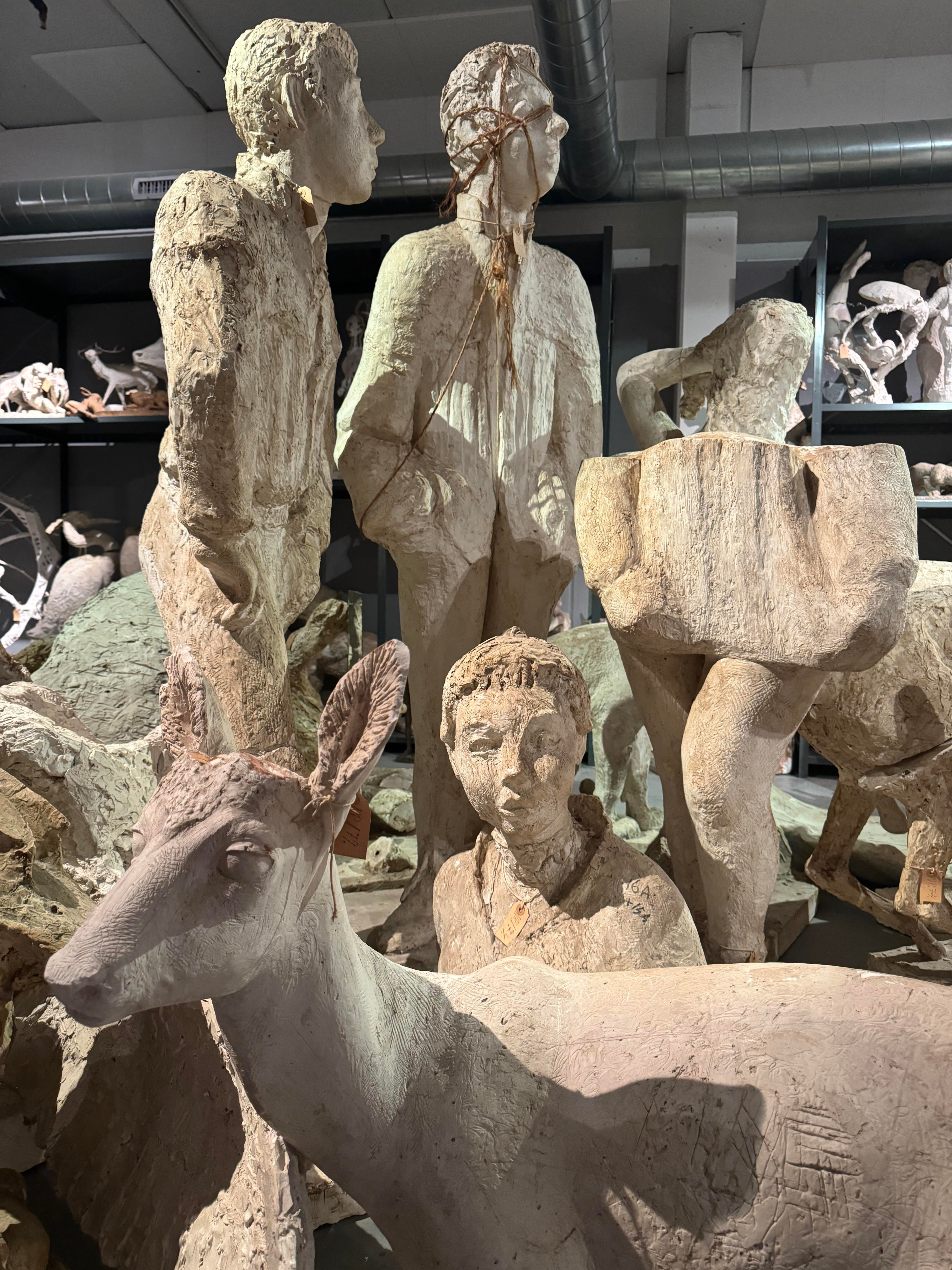 Sculptures of people and roe deer