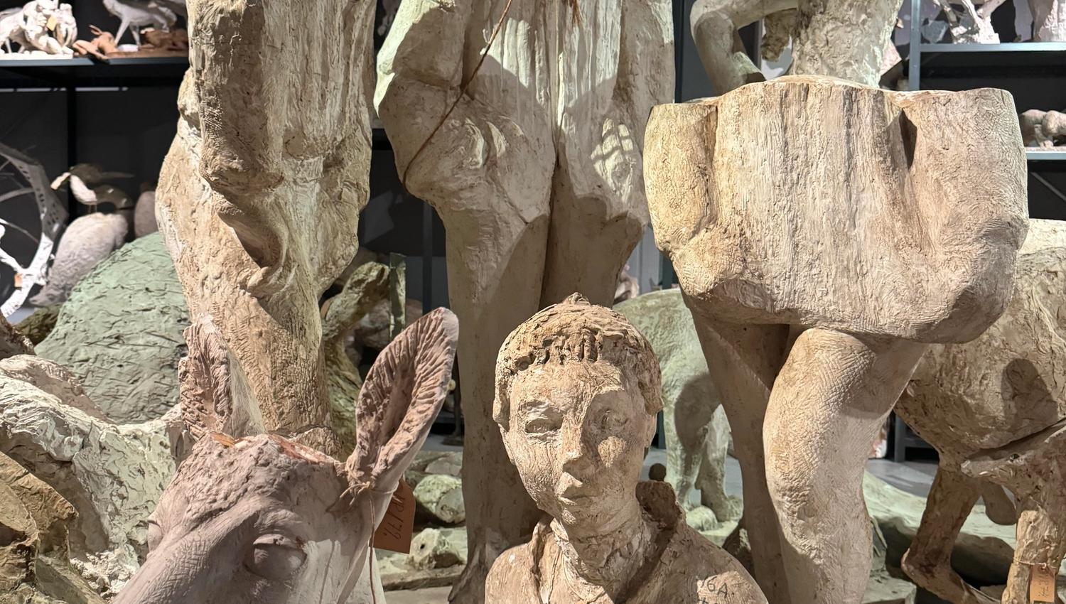 Sculptures of people and roe deer