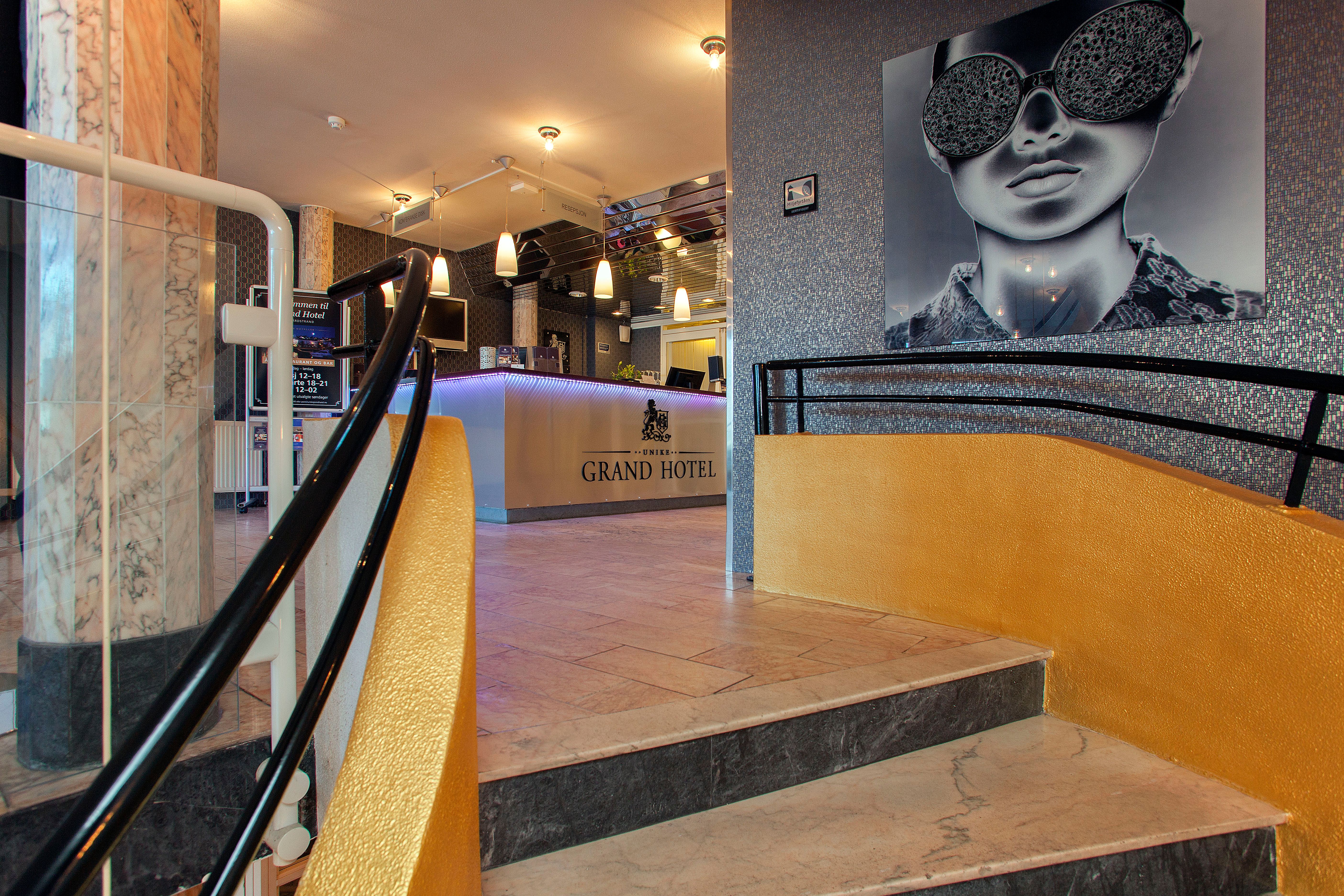 Stairs, with a picture on the wall