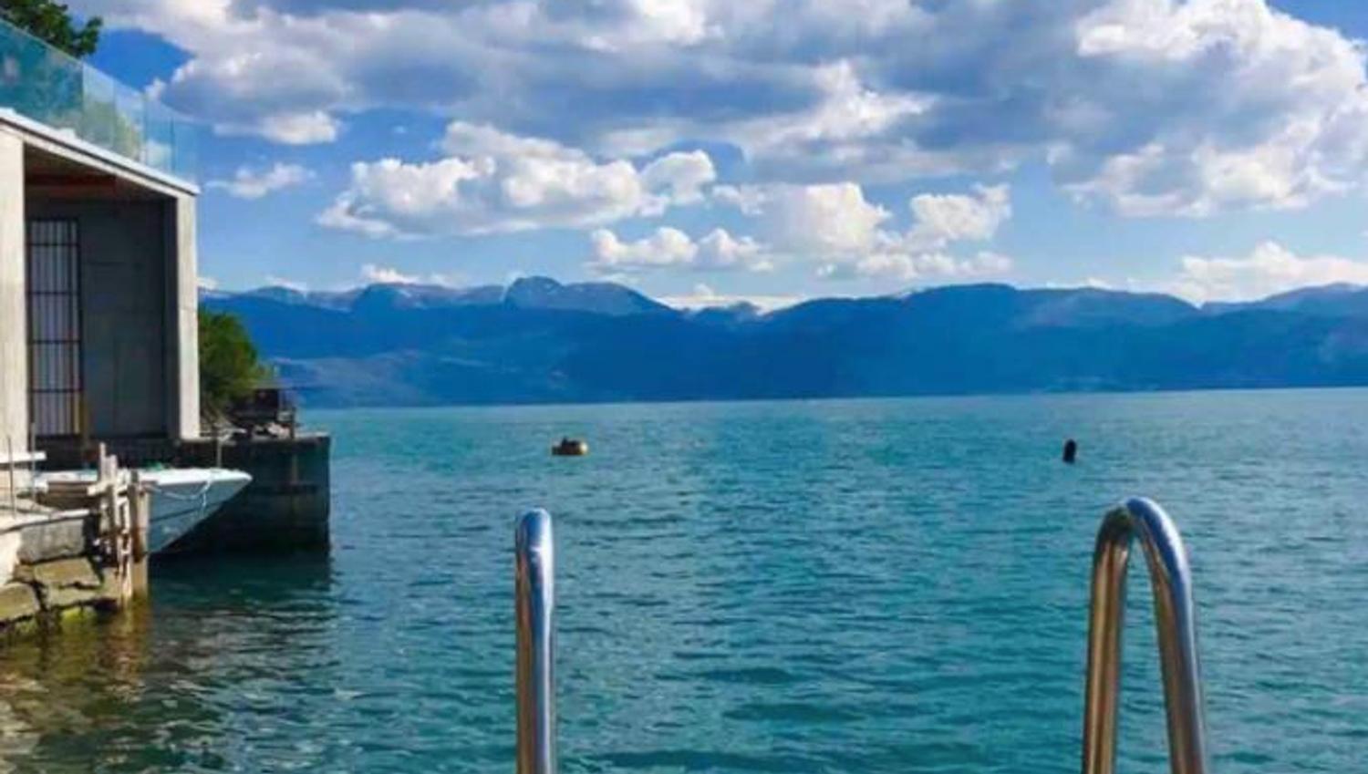 Private swimming spot with a ladder leading directly into the Hardangerfjord – perfect for a refreshing dip.