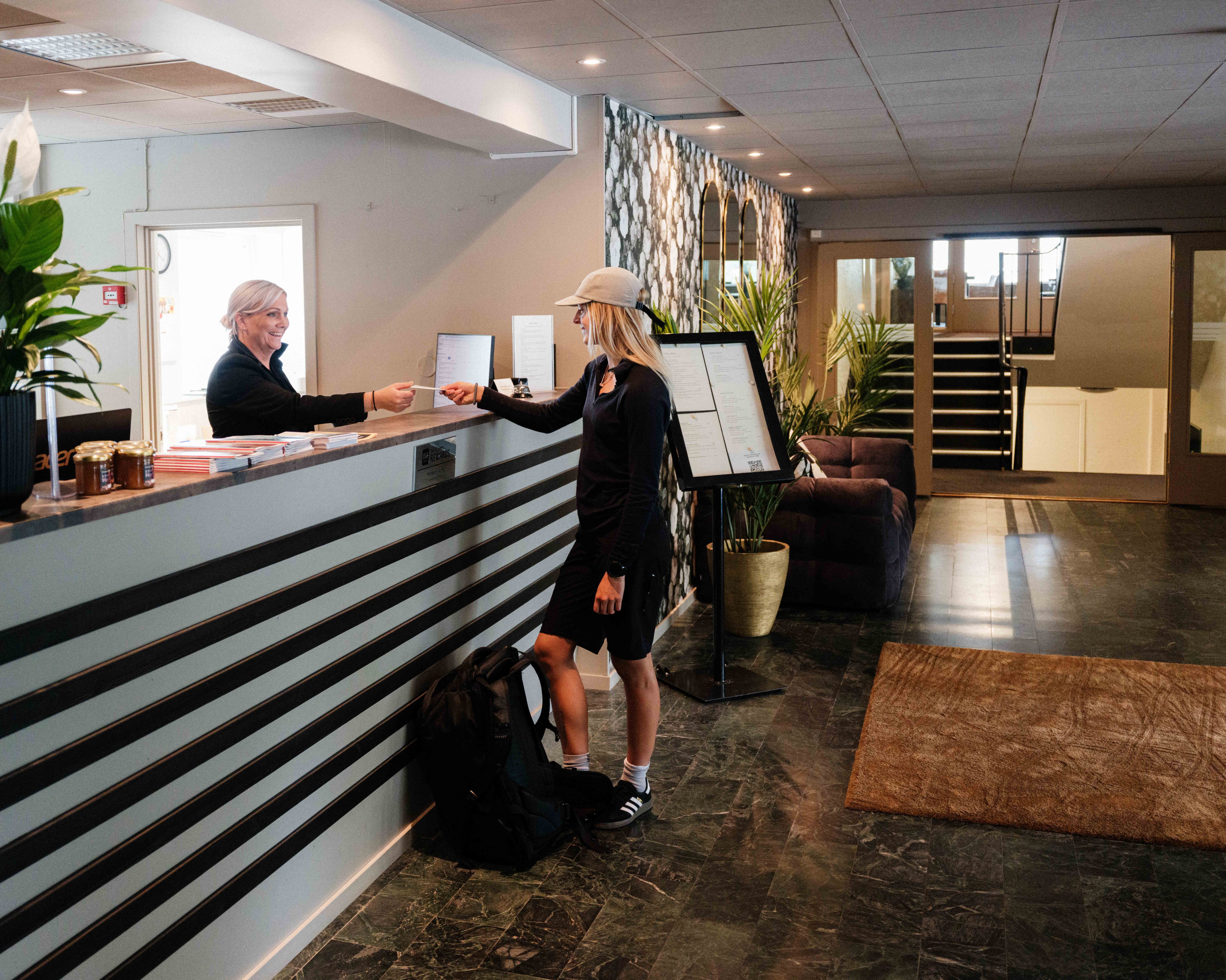 Check-in at the reception of Kinsarvik Fjordhotel – ready for a fjord holiday!