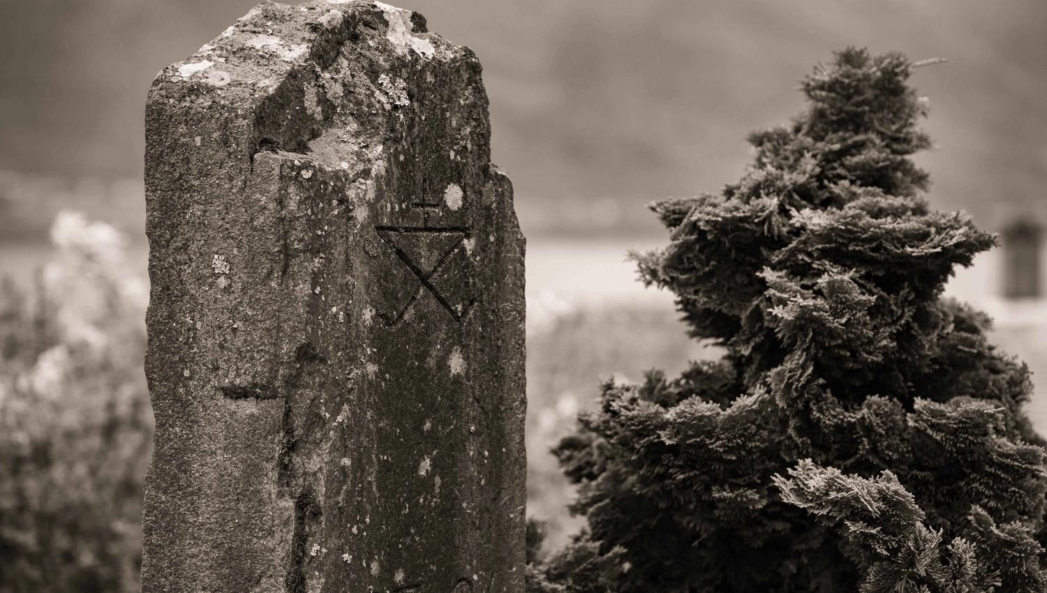 Alde logo engraved in an old stone by the orchards in Hardanger.