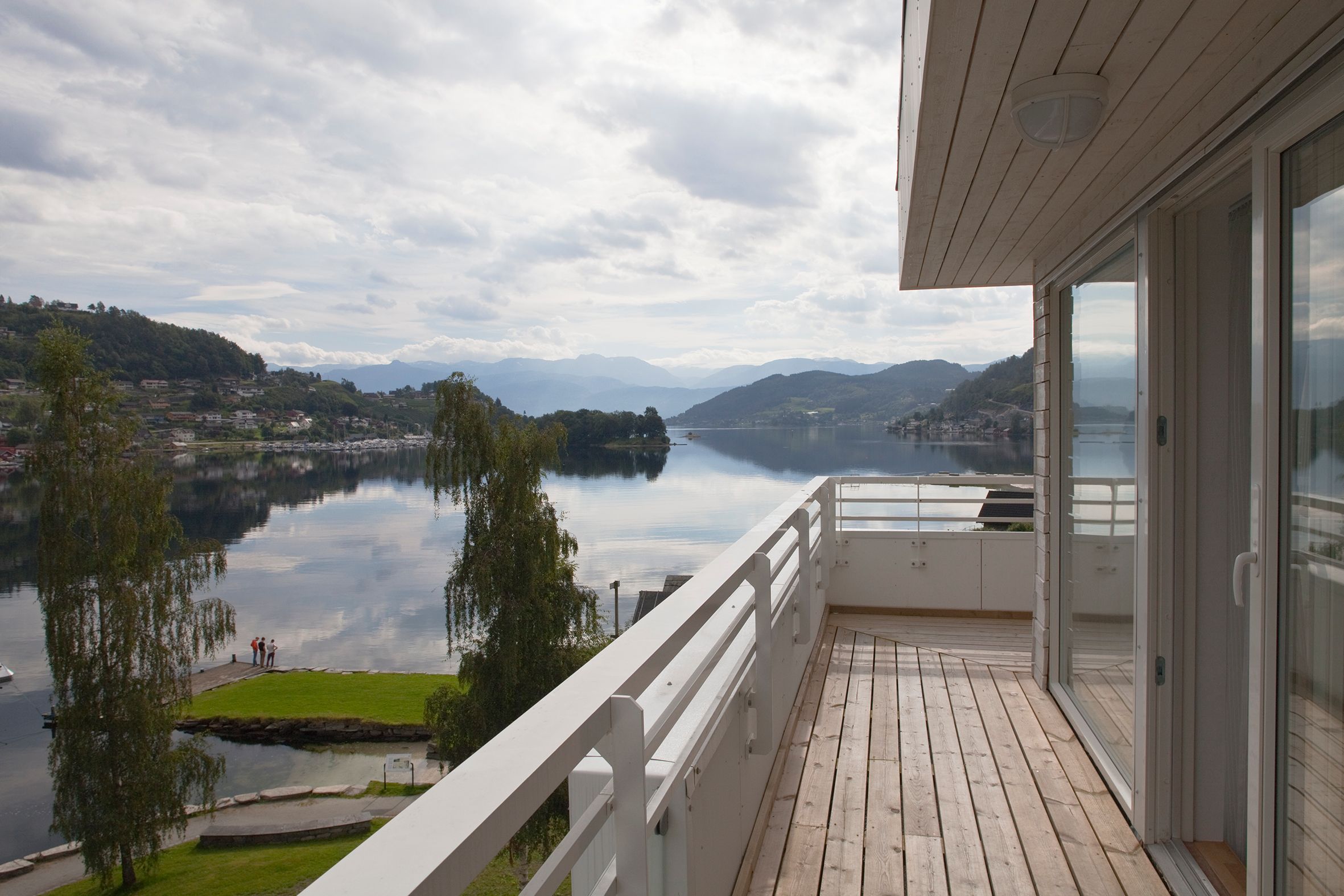 Balcony at Thon Hotel Sandven with a spectacular view of the Hardangerfjord and mountains.