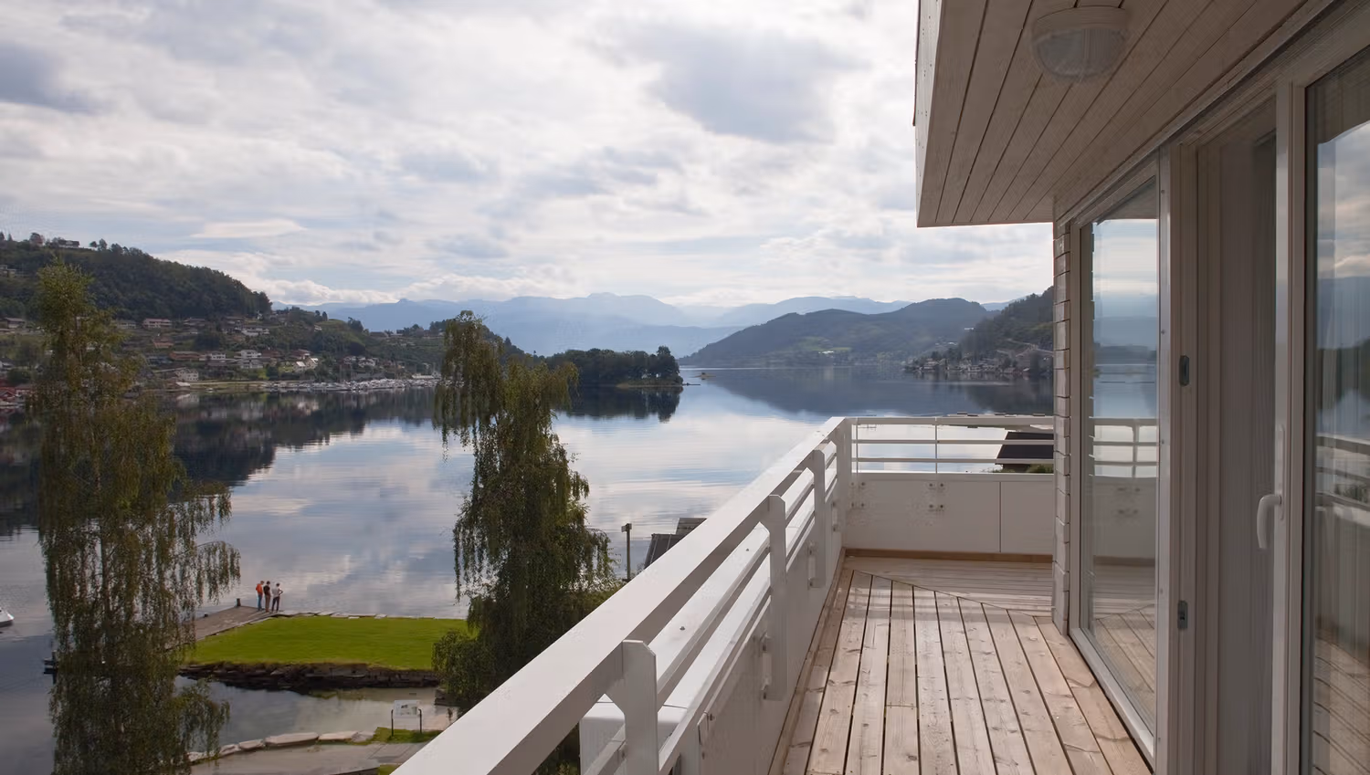 Balcony at Thon Hotel Sandven with a spectacular view of the Hardangerfjord and mountains.