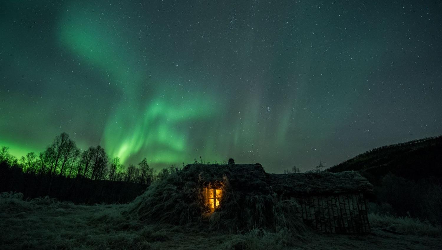 exterior of Viking building, with northern lights above