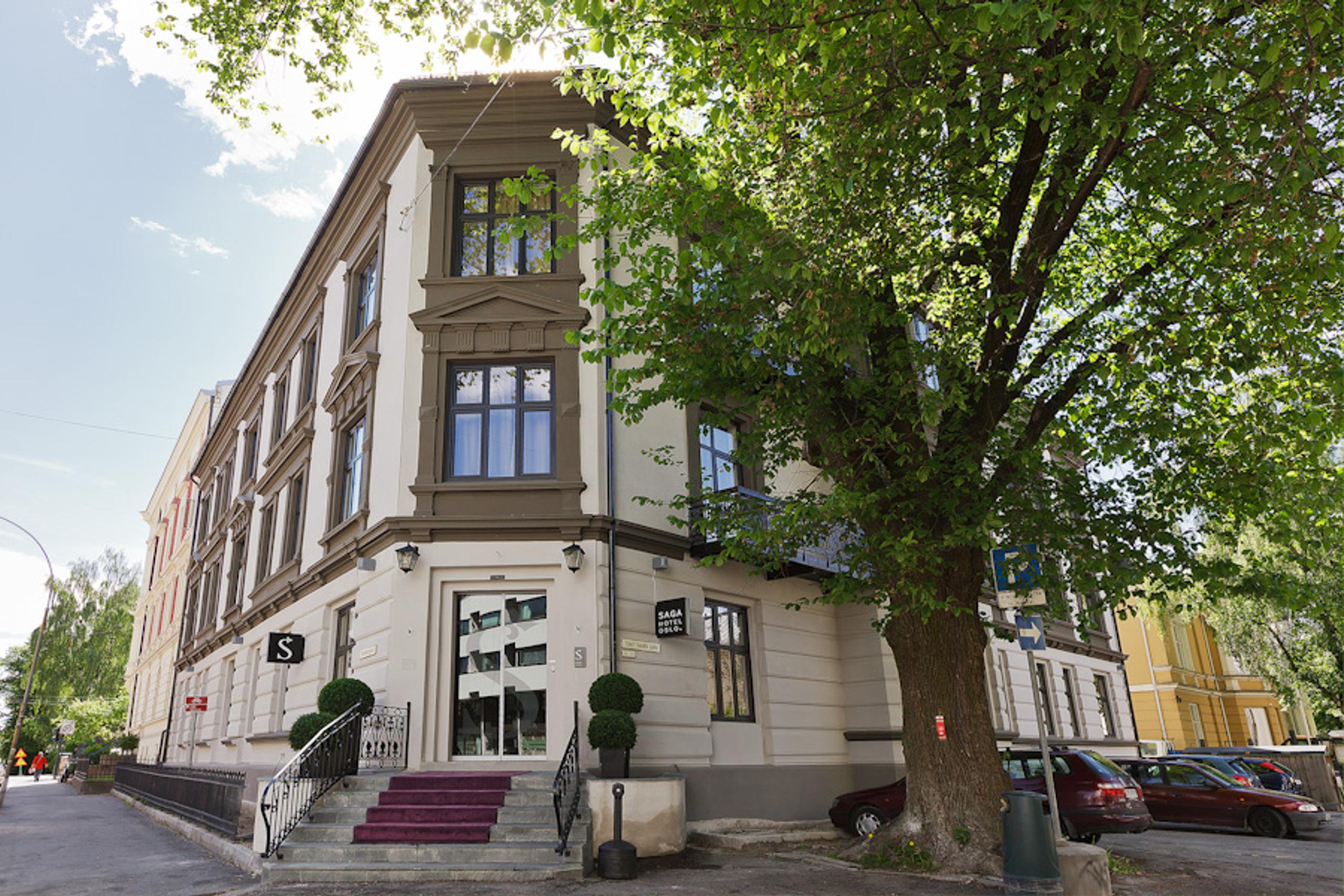 Street view Saga Hotel Oslo. Three floors, 19th century building. Photo