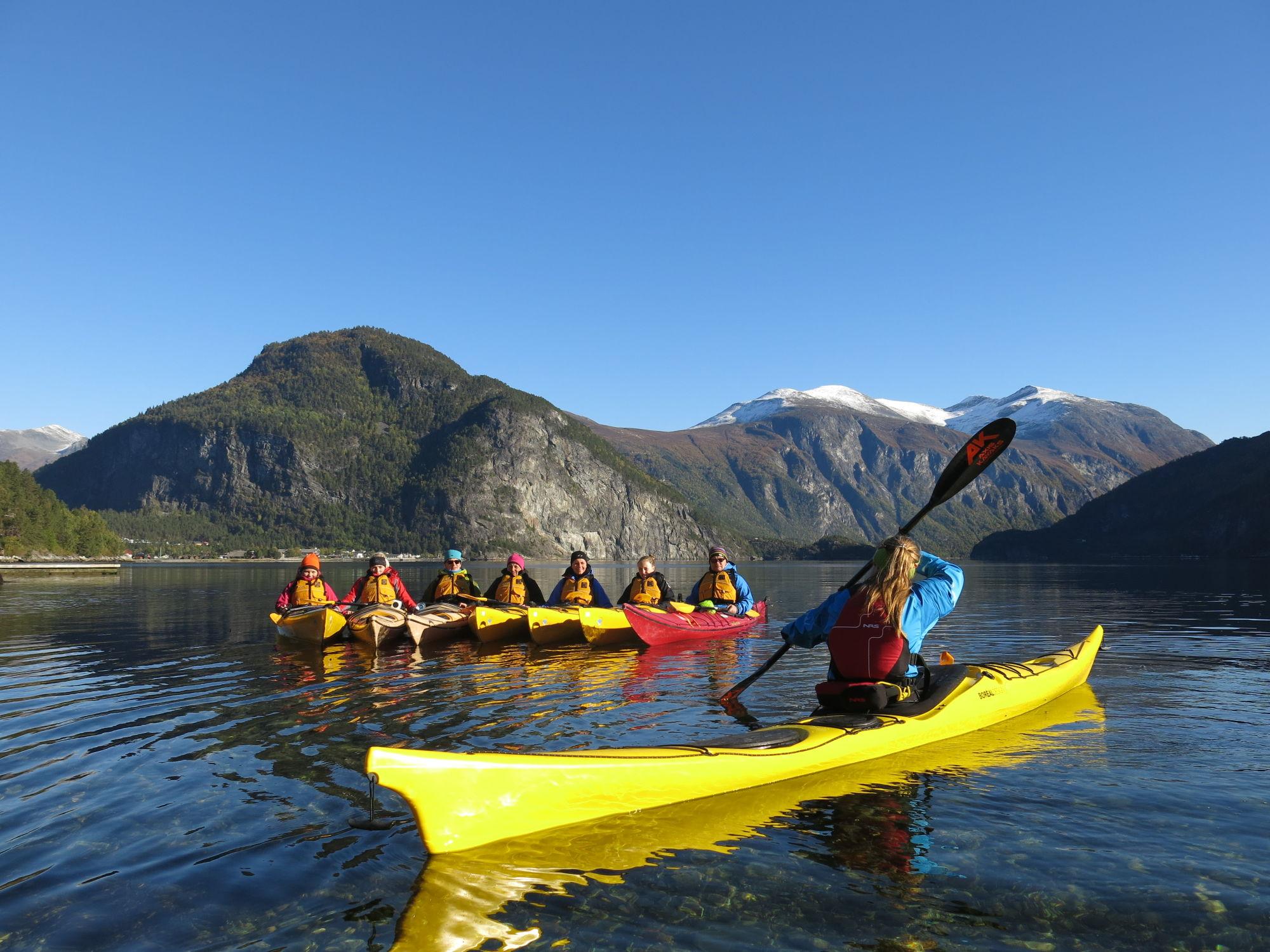 Family kayaking trip on the fjord with Uteguiden in Valldal