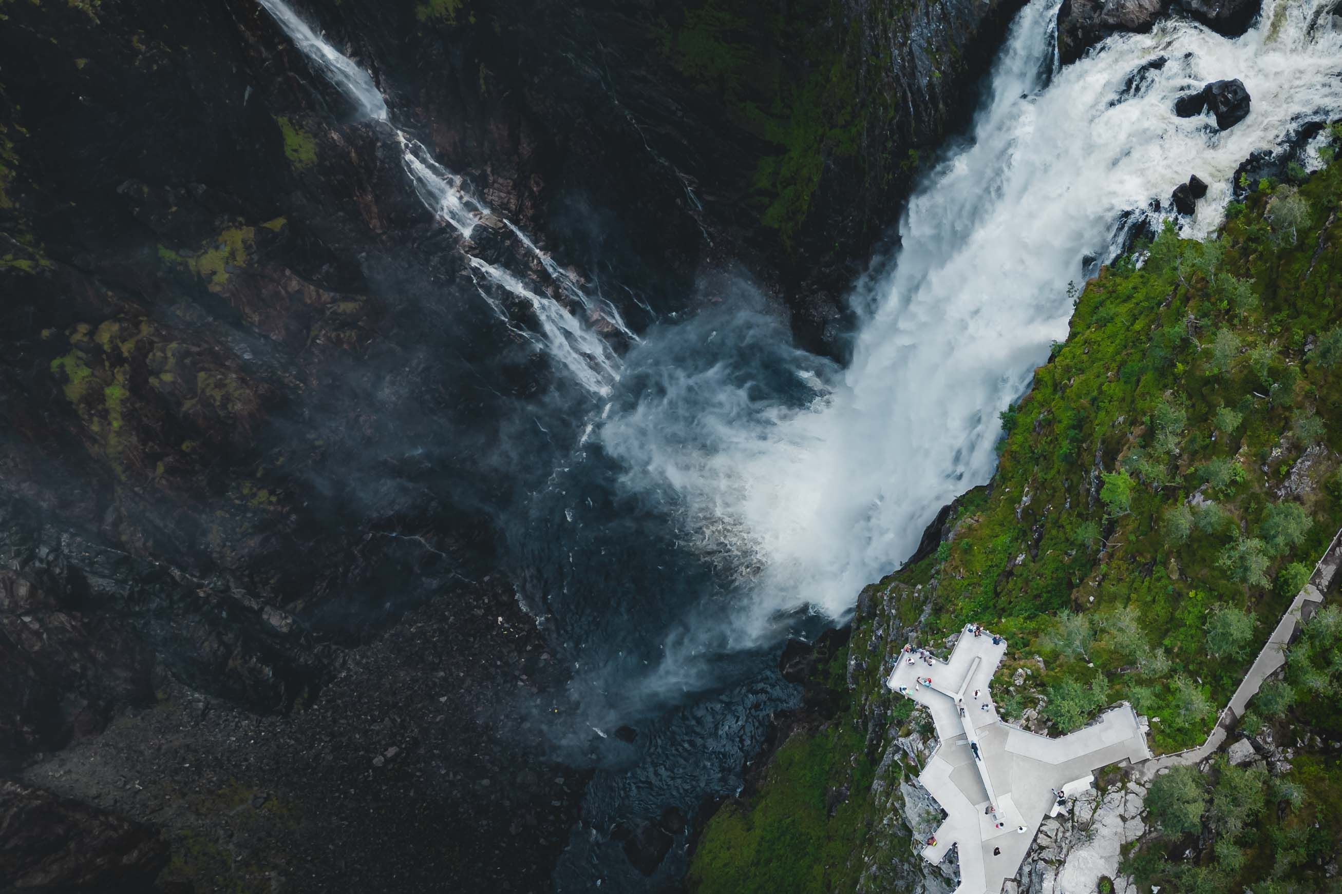 A top down drone photo of the new viewing platform with the waterfall in the background.