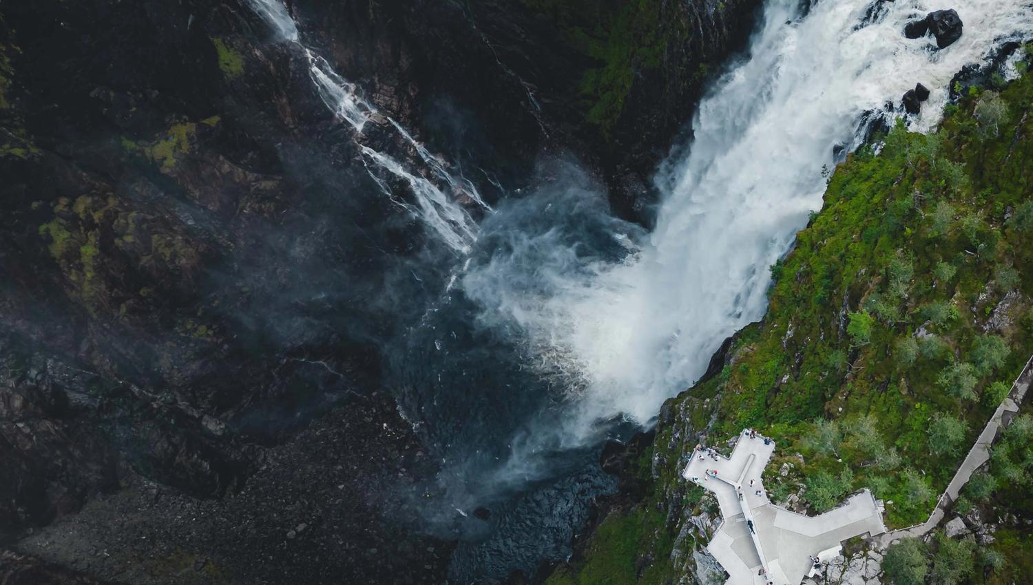 A top down drone photo of the new viewing platform with the waterfall in the background.