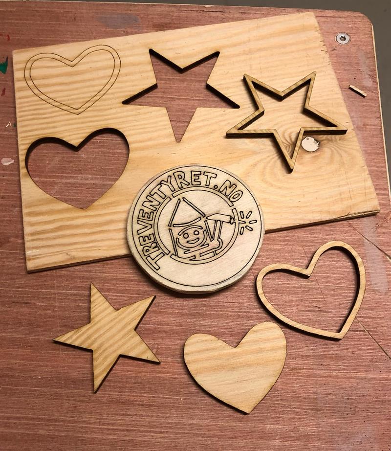 Trefigurer skjært med laser