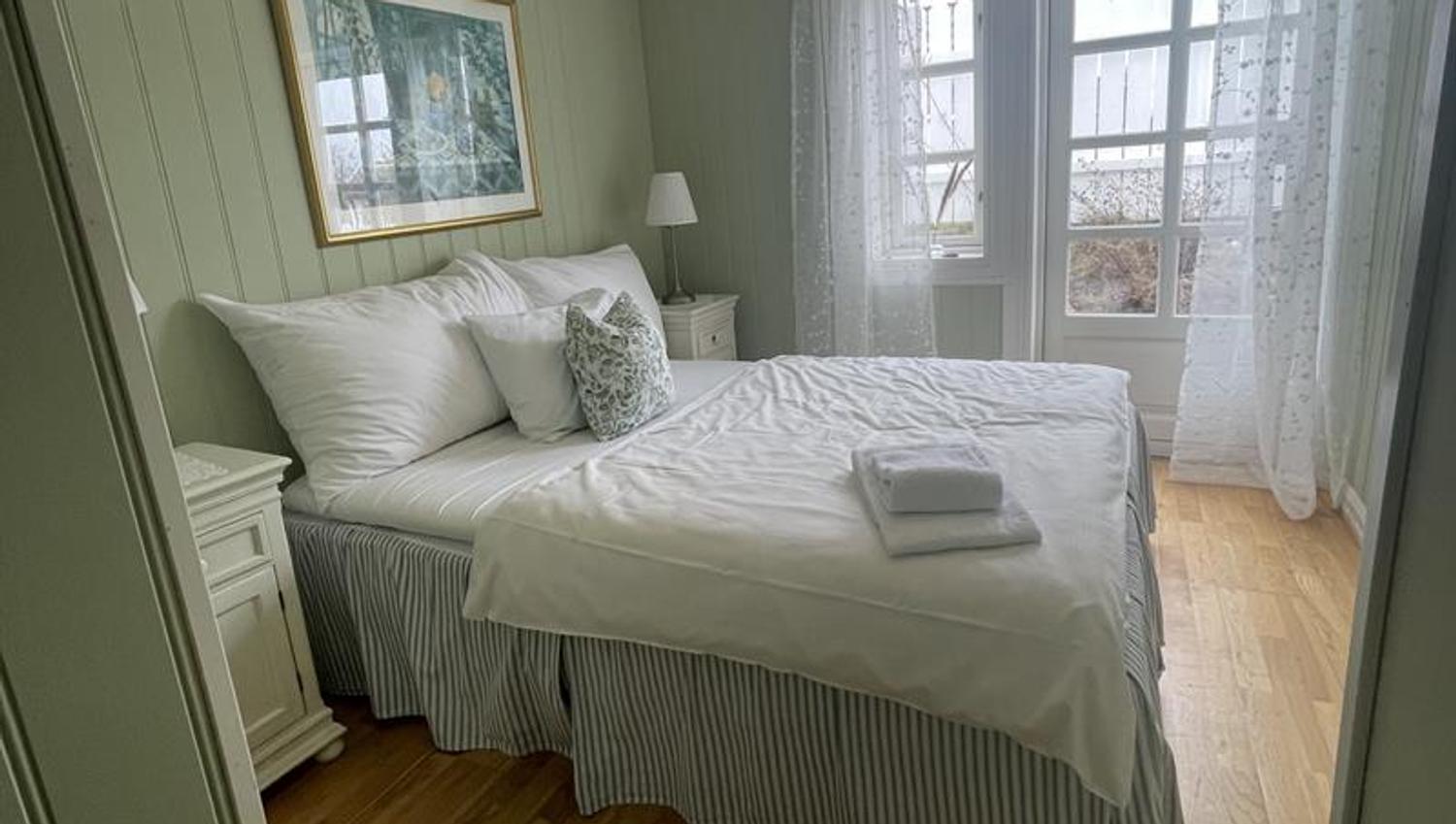 Green bedroom with bed