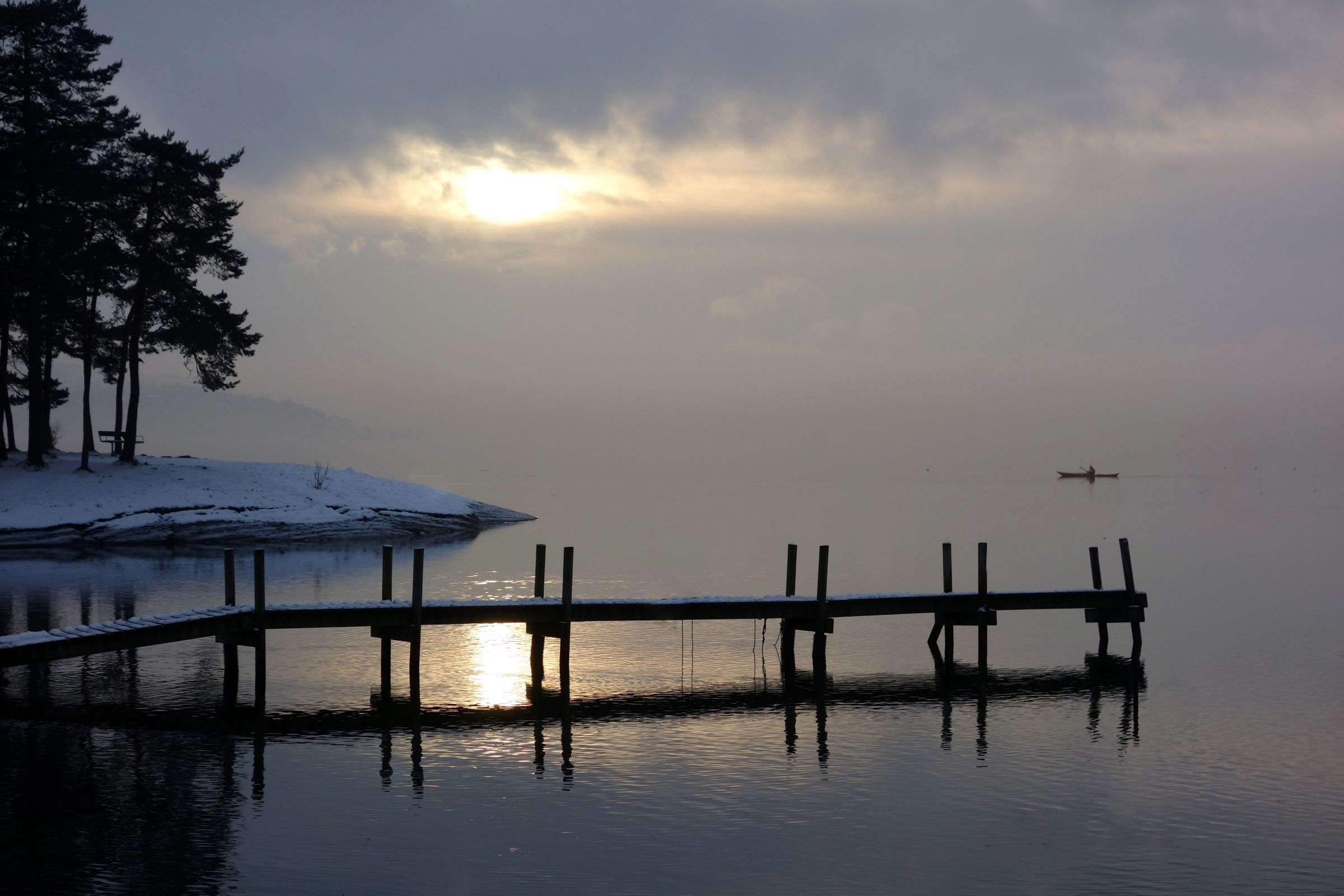 Overcast sky during winter and a pier.