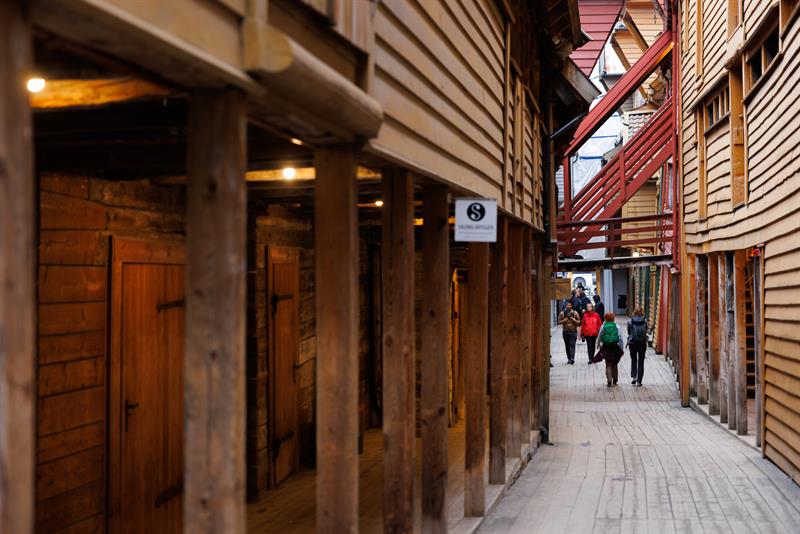 Exploring the narrow alleyways at Bryggen in Bergen