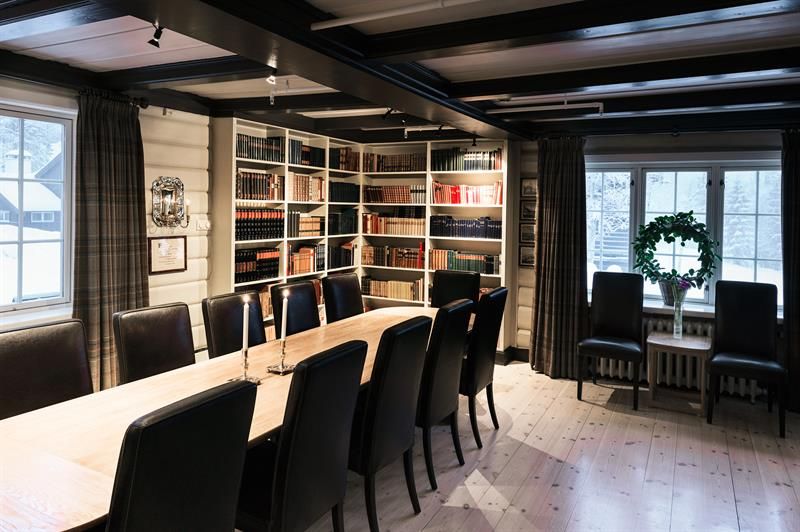 Long table, book cases. Photo