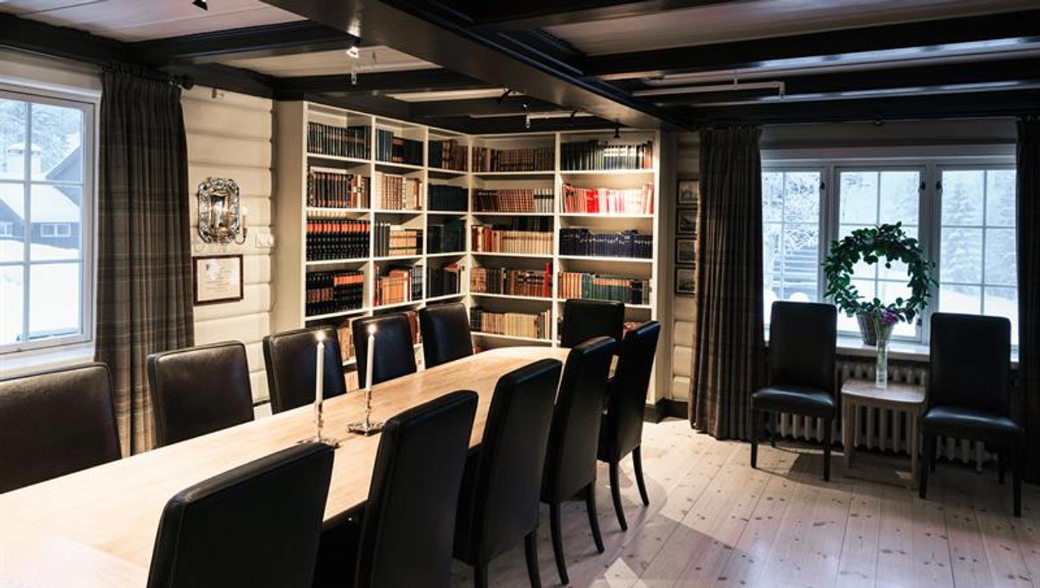 Long table, book cases. Photo