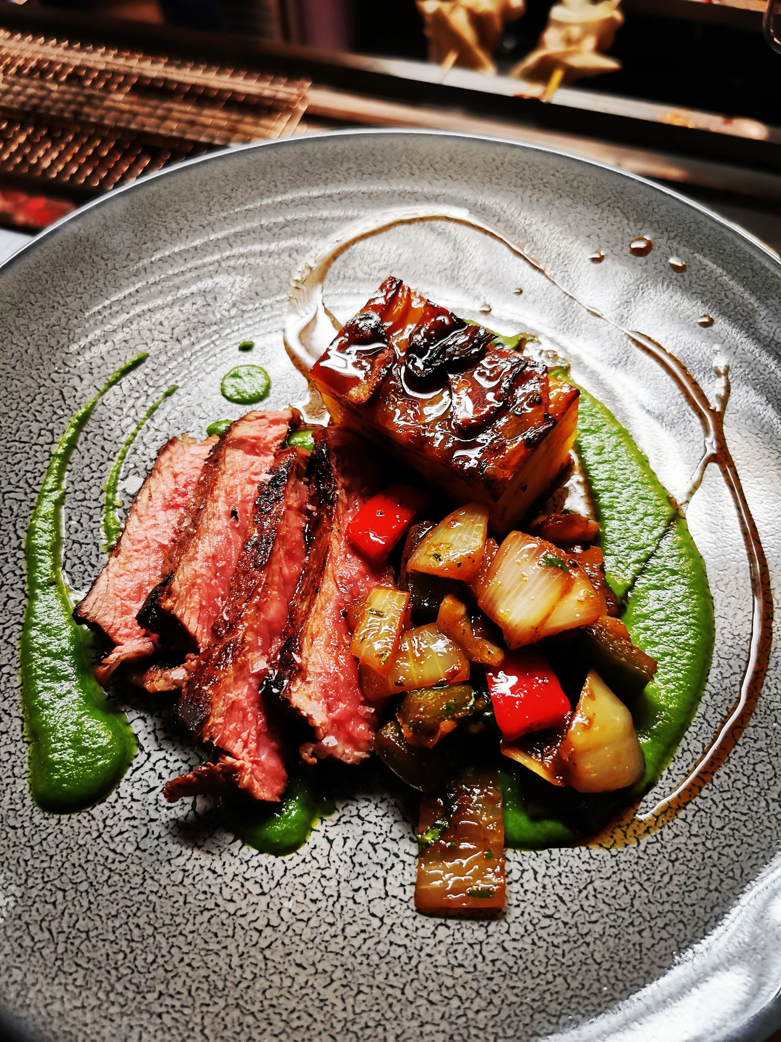 Food that is platedPlated meat dish with vegetables