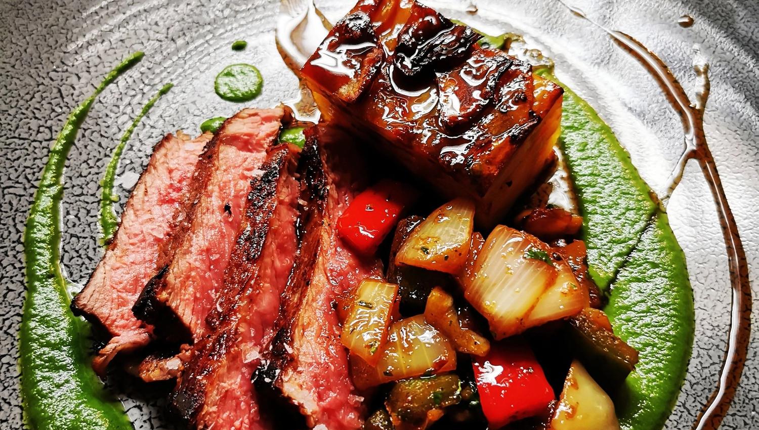 Food that is platedPlated meat dish with vegetables